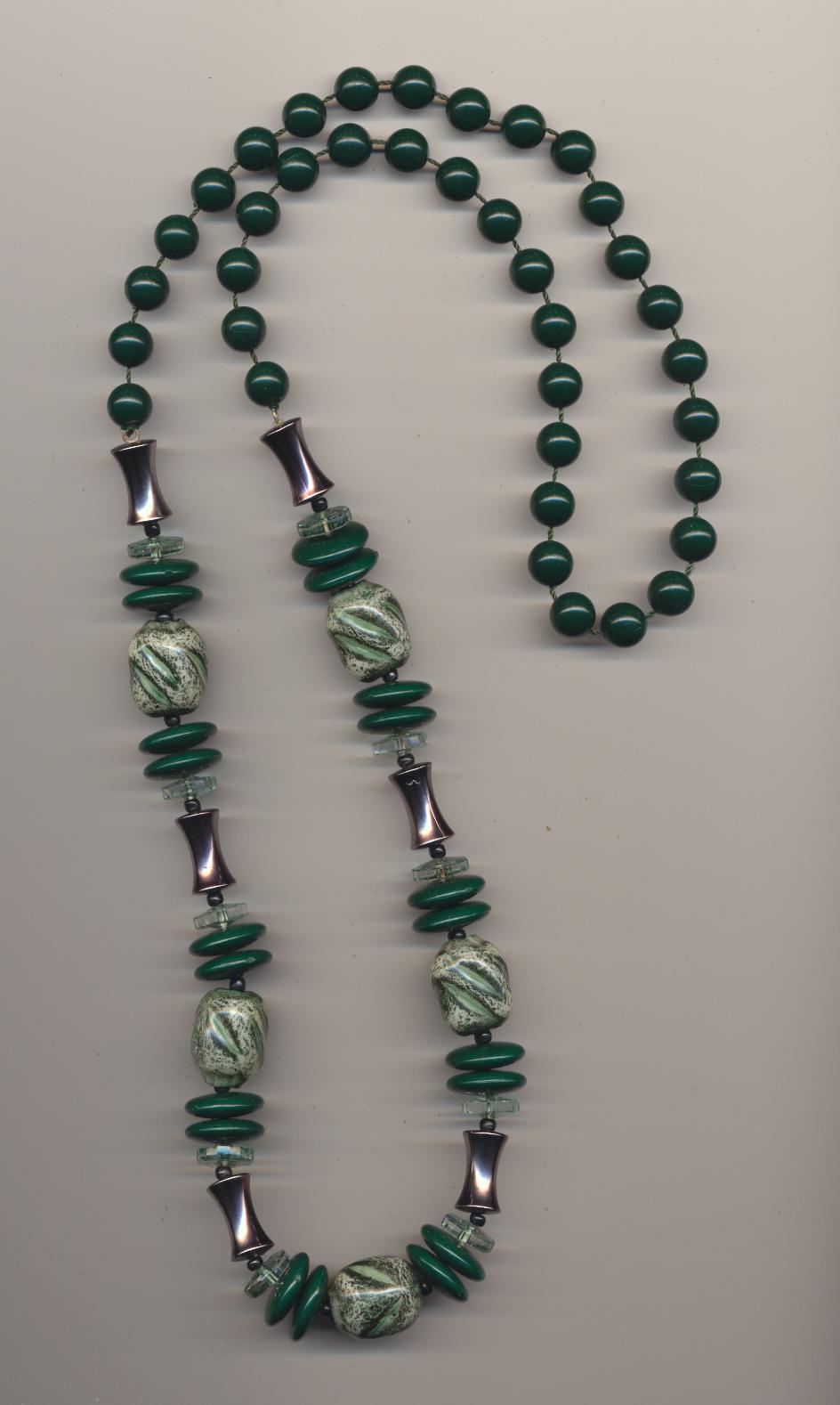 Necklace made of imitation and real green plastic beads, 1970's, length 32'' 82cm.