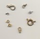 Clasps of different style: bronze, silver and gold colored metal spring-ring and lobster claw.