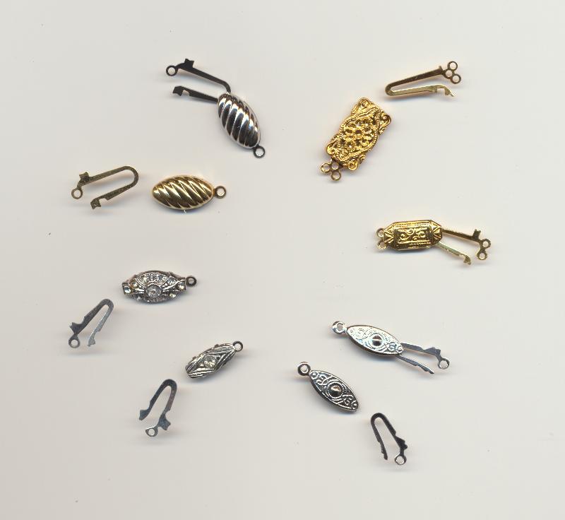 Fish-hook clasps - open: old and new, plain and decorated, nickel, silver and gold colored metal.