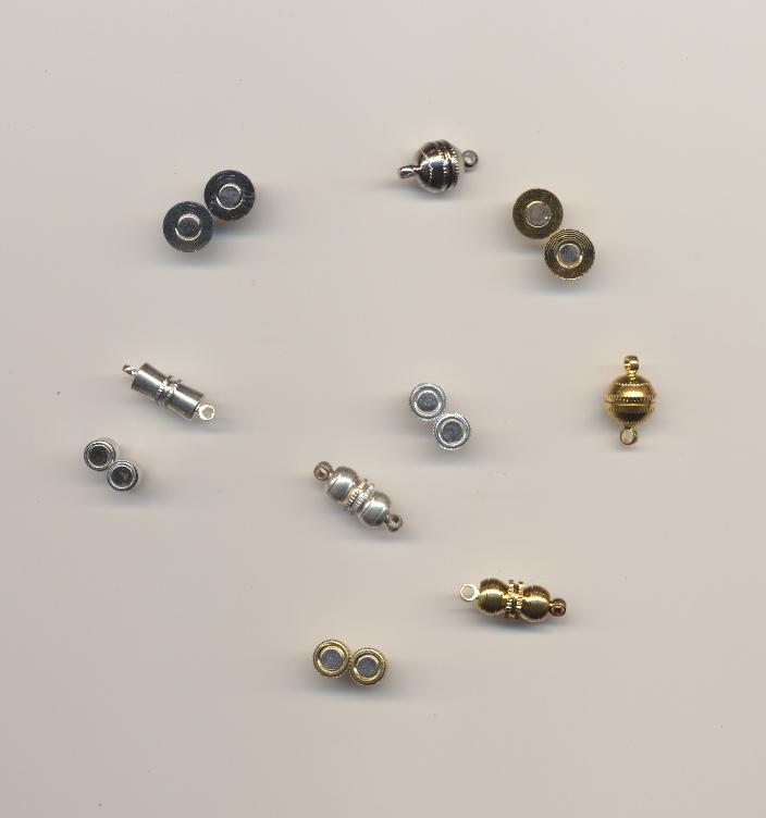 Small metal magnetic clasps - open and closed: nickel, silver, and gold colored.