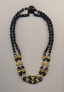 Elegant vintage necklace made of black Czech French jet glass and gold color metal bow beads, Czechoslovakia, 1960's, length inner row 16.5'' 42cm., outer row 18'' 45cm.