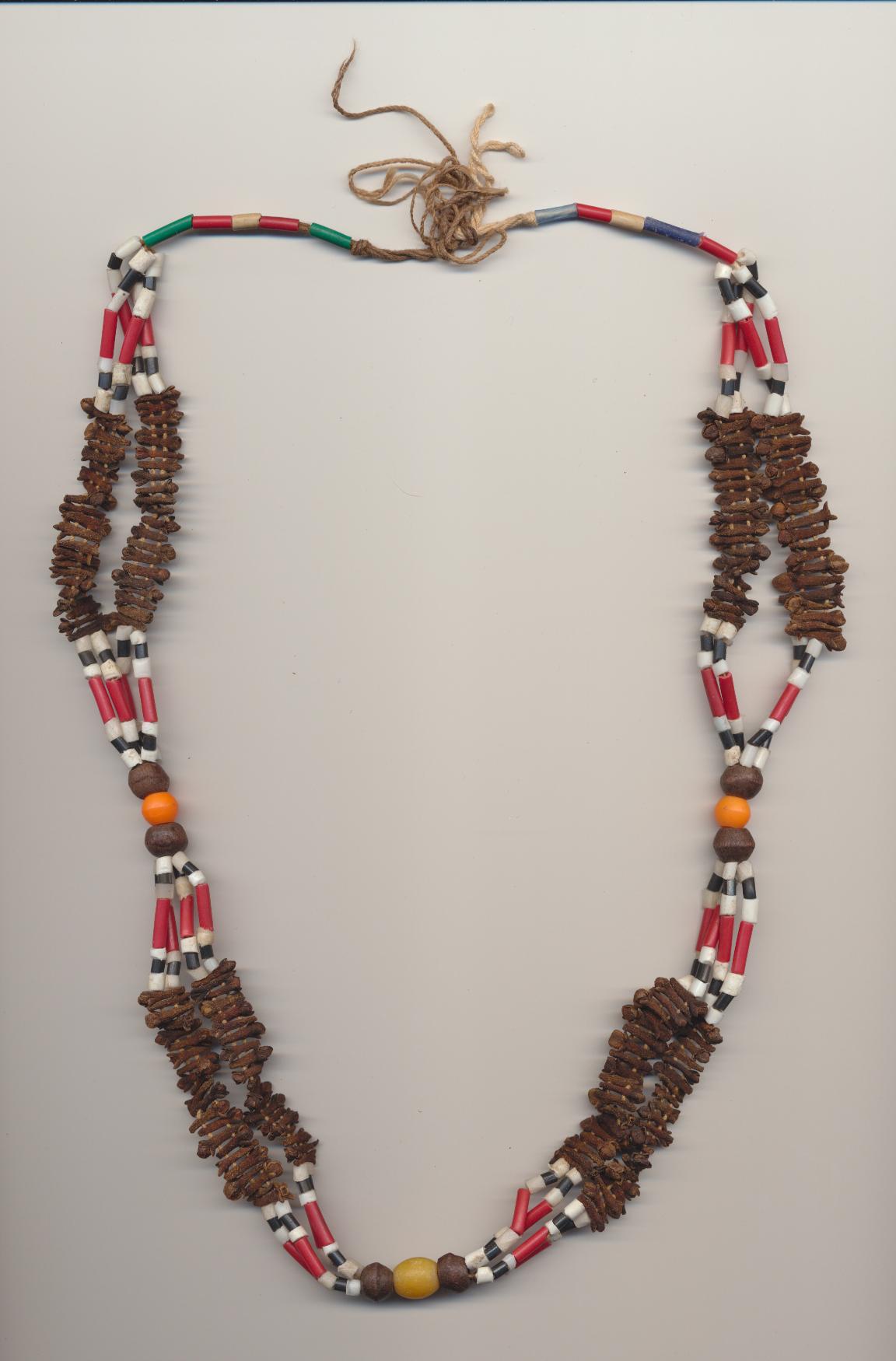 Bedouin necklace from the Negev (Israel), cloves, wooden and plastic beads imitating, among other, coral, amber and camel bone, length 26'' 66cm.