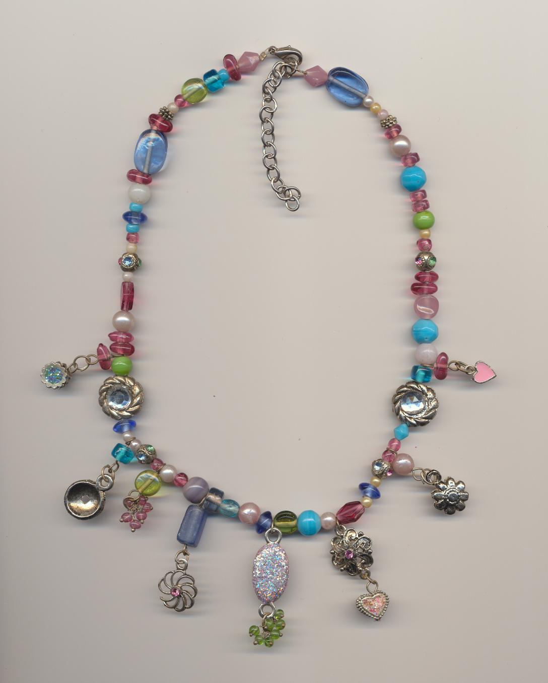 Cheerful modern multicolor bead necklace with extension chain, made of glass beads, various metal elements and glass crystals, ca.2010, length 16.5'' 42cm.