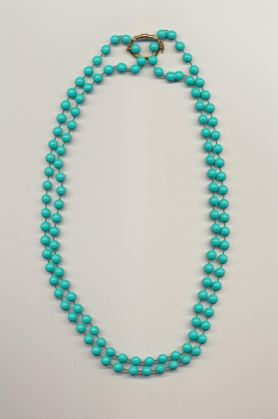 A Double or Four Strand Bead Necklace Made Of One Necklace And A Pearl Shortener