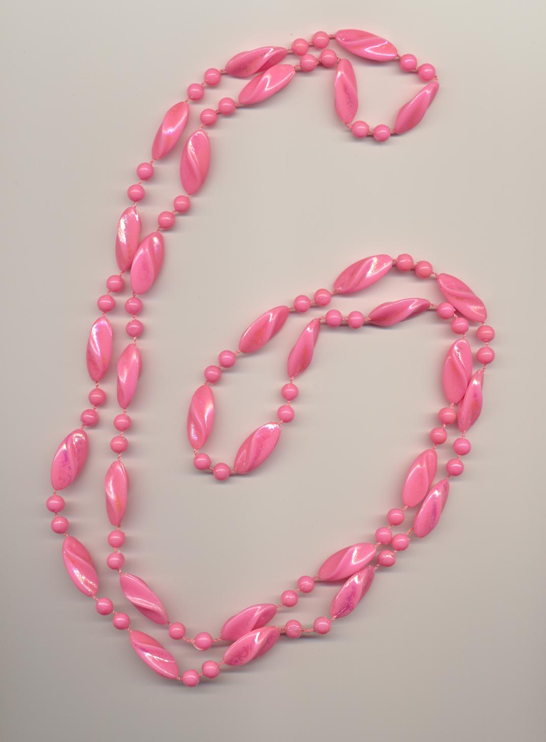 Pink color long plastic imitation bead necklace, 1980's, length 47'' 120cm.