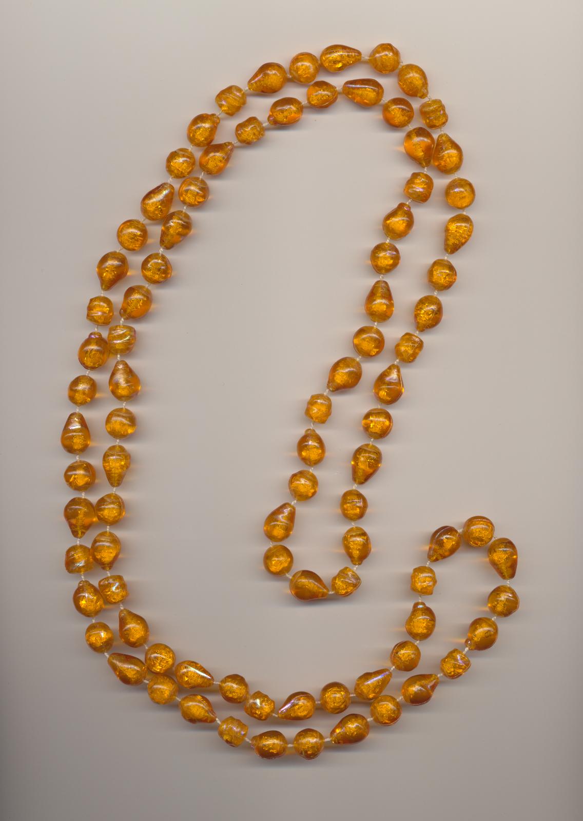 Long yellow amber color plastic imitation bead necklace, length 49'' 124cm.