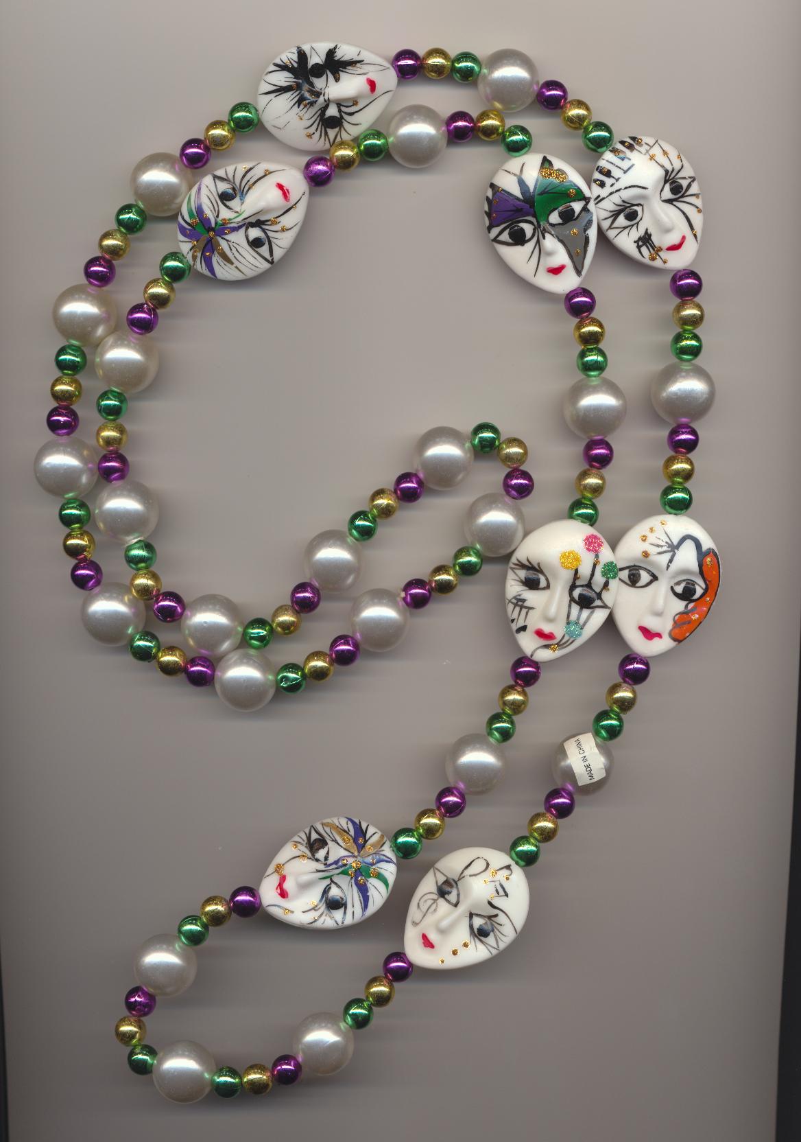 Hand painted lady face beads necklace made of plastic beads, Mardi Gras Parade 1996, New Orleans, made in China, length 50'' 126cm.