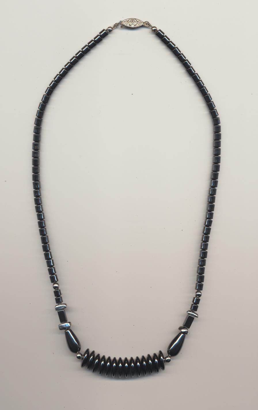 Necklace made of hematine and silver color metal beads, China, 1990, length 25'' 50cm.